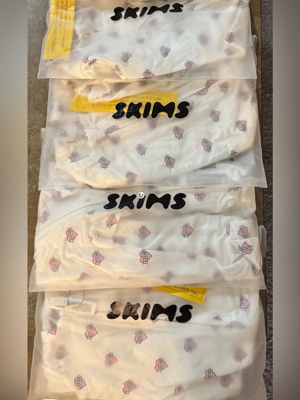 SKIMS Sleep Baby Onesie - Marble Heart Banner (multi sizes)